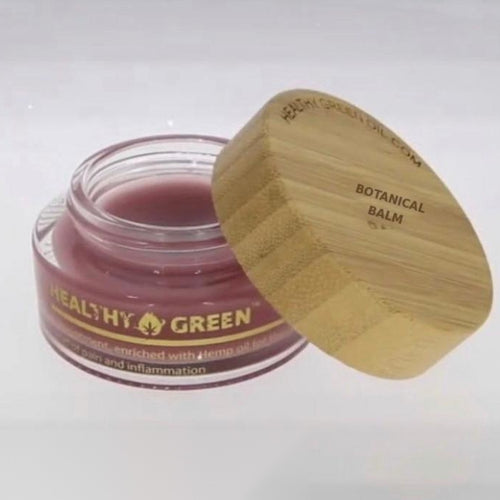 Healthy Green Botanical Balm — Ease, open glass jar of rose balm with its engraved bamboo Botanical Balm lid